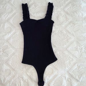 Black ruffled strap bodysuit
